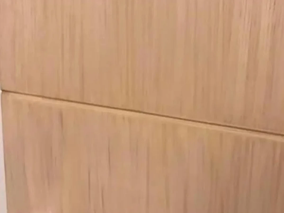 Timber door surface restoration after repair